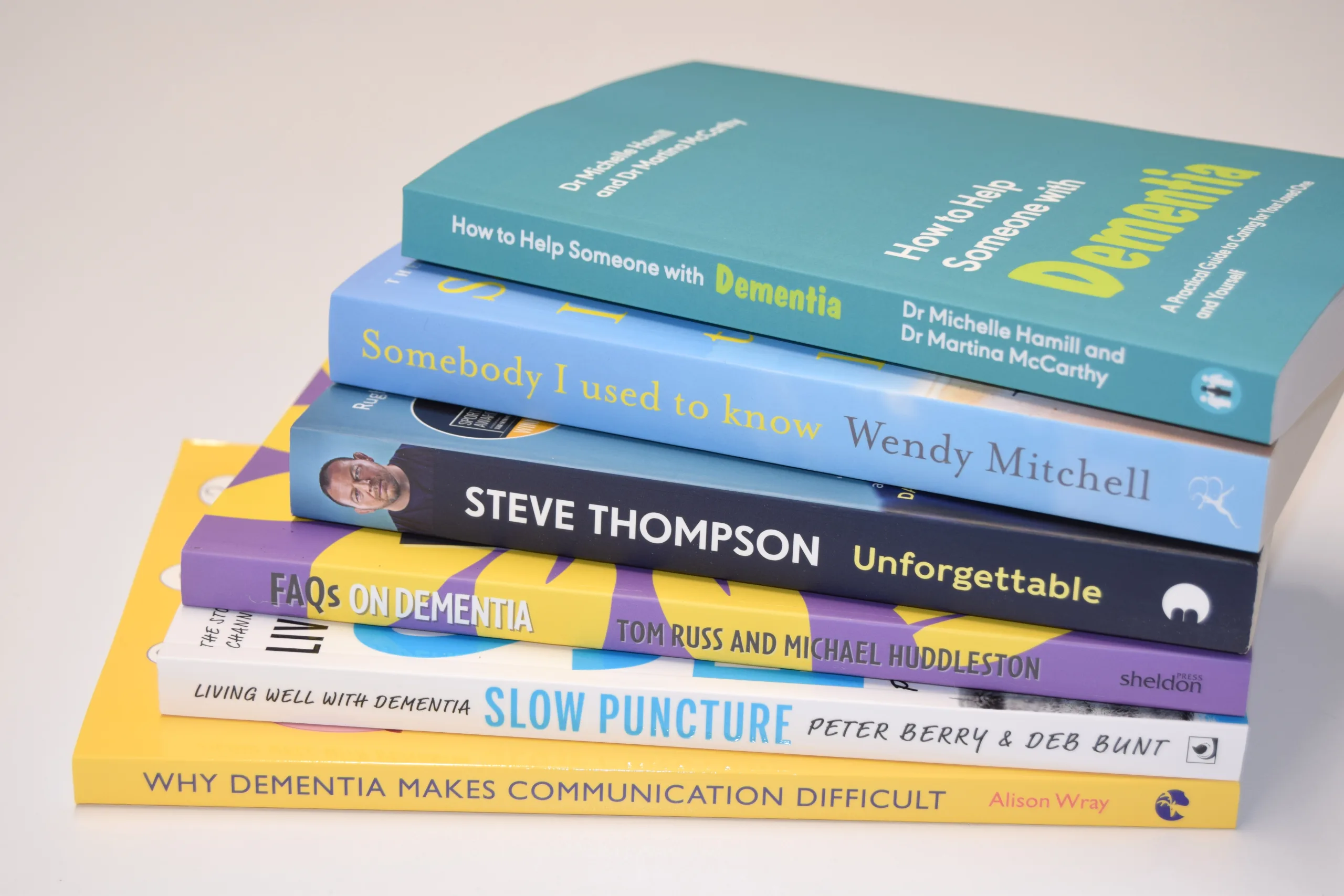 Stack of books from the Reading Well for dementia booklist